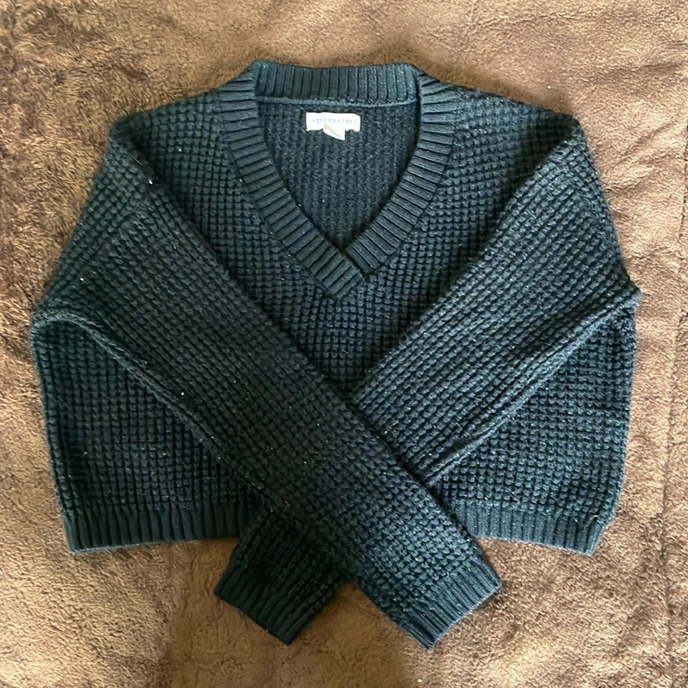 Women’s crops black & glitter sweater worn twice very cute and stylish.